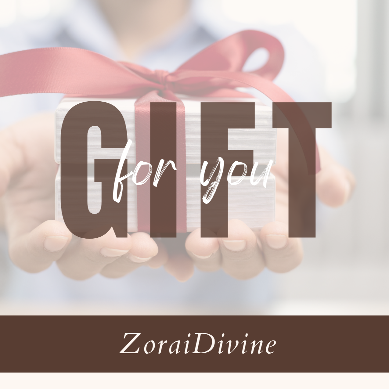 Hands holding a gift box with a pink ribbon and 'Gift for you' text, blurred background with 'ZoraiDivine' branding.